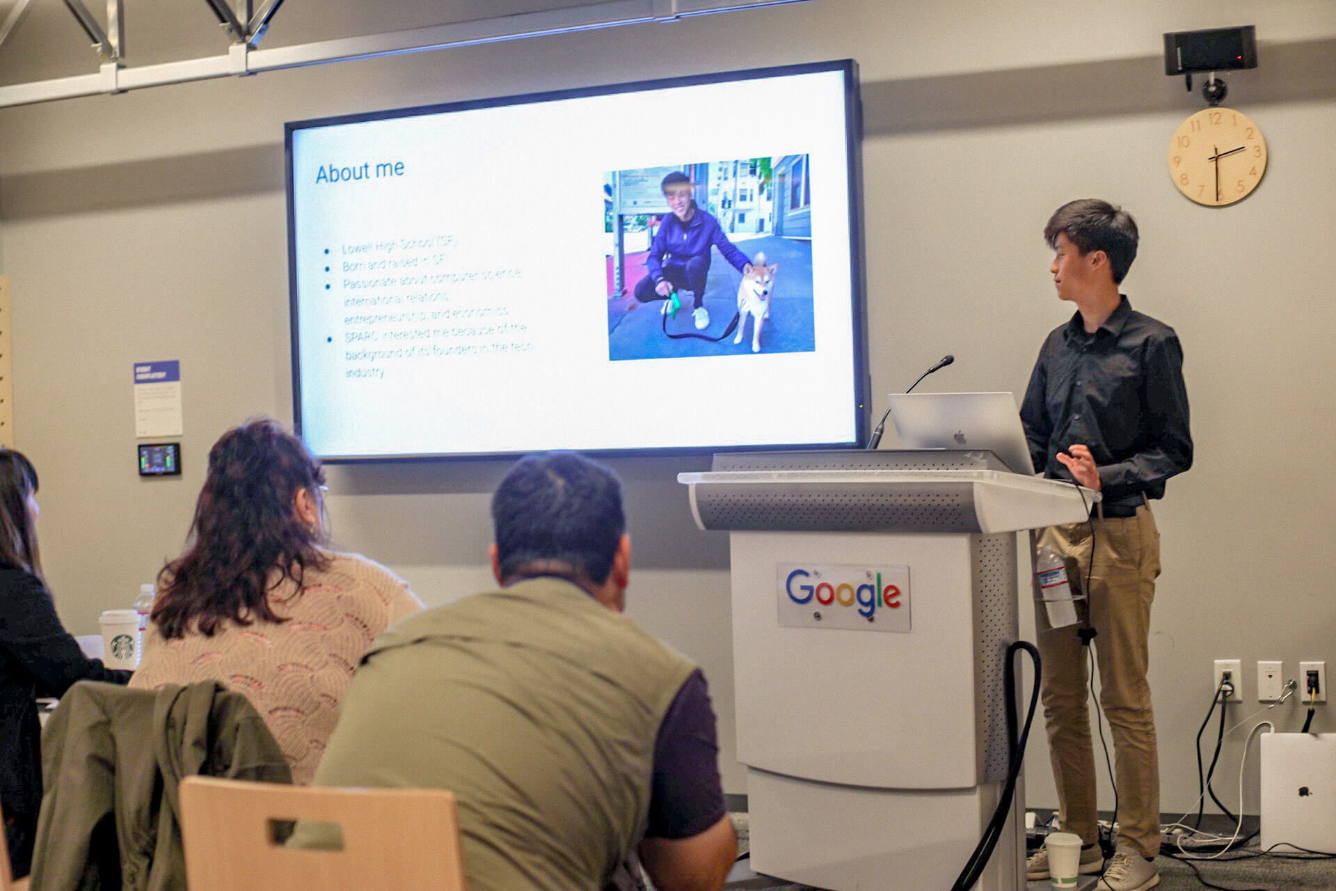 Student presenting his project at Google's Community Space